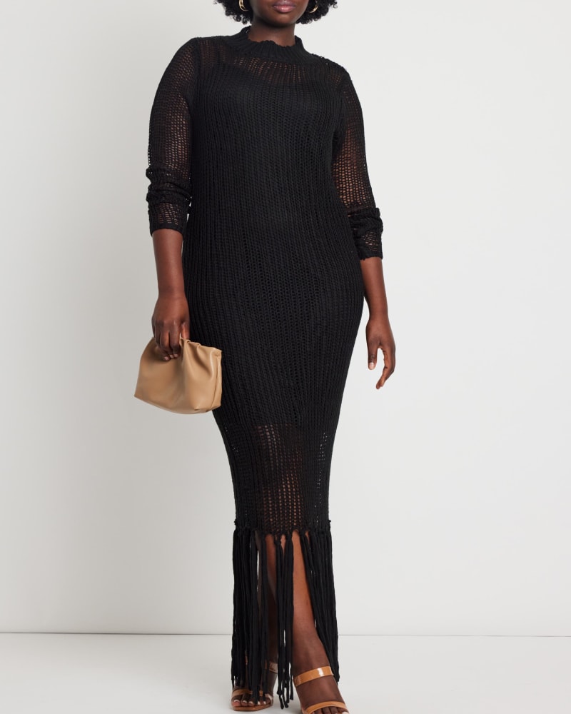 Front of a model wearing a size 14/16 Adrianne Open Stitch Dress in Totally Black by ELOQUII. | dia_product_style_image_id:236276